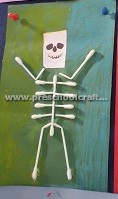 kindergarten-making-skeleton-with-ear-stick