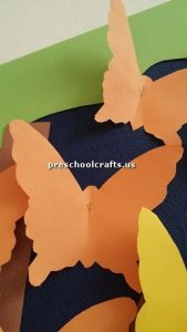 Make butterfly with colored paper for pre school