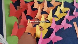 Make butterfly with colored paper for preschoolers