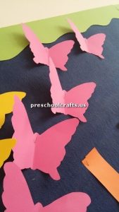 Make butterfly with colored paper bulletin board